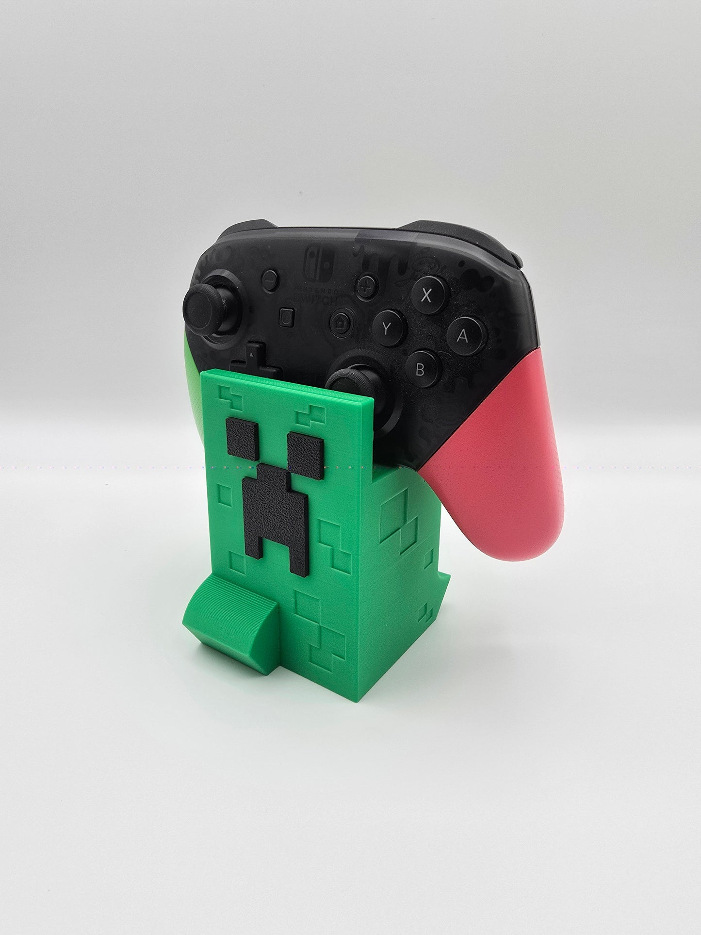 Minecraft Creeper Nintendo Switch controller and Joy-con holder, custom 3D printed gaming accessory from Tarbon Designs.