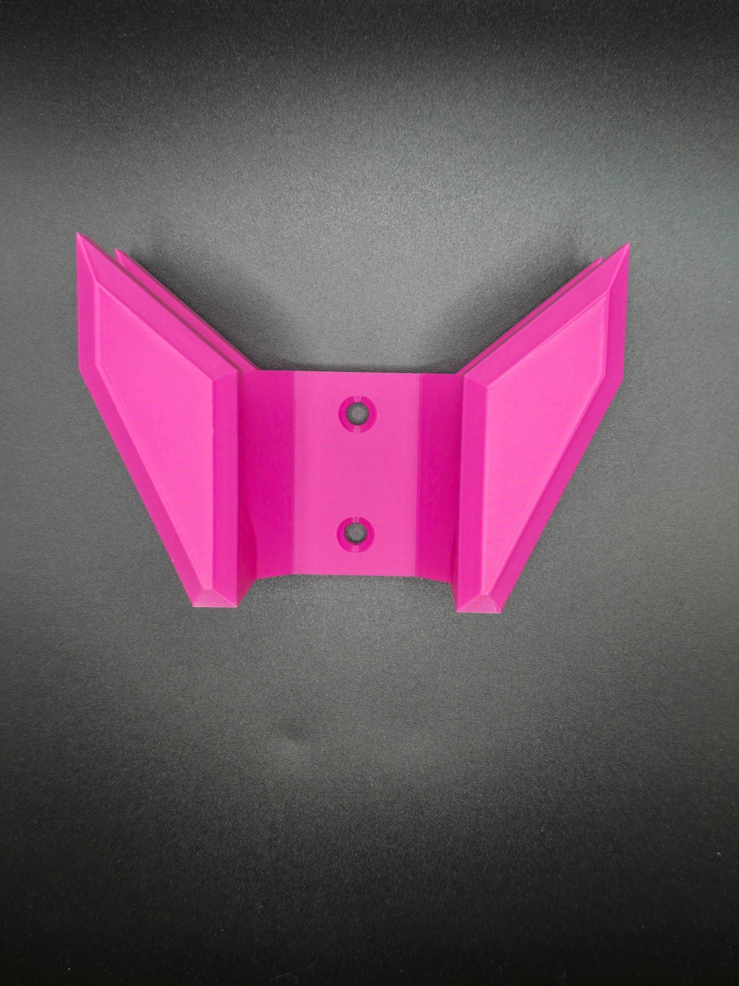 Vibrant pink pickleball paddle wall mount with sleek, modern design and sturdy metal hardware