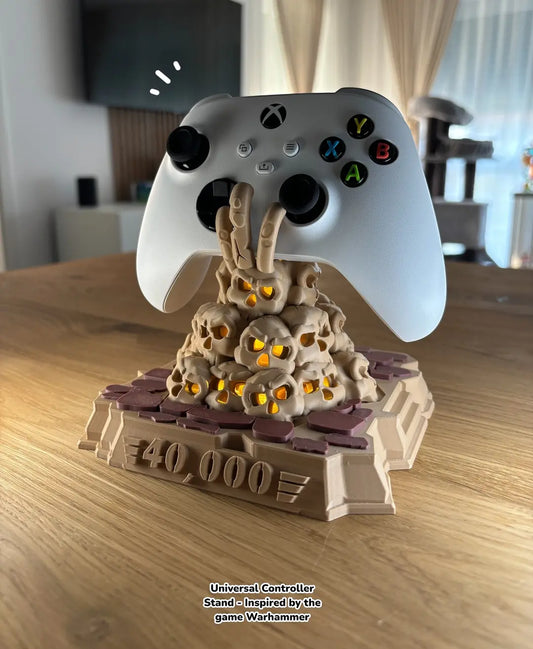 Detailed 3D printed model of a game controller inspired by the Warhammer 40,000 universe, featuring a rock-like surface and colorful accents.